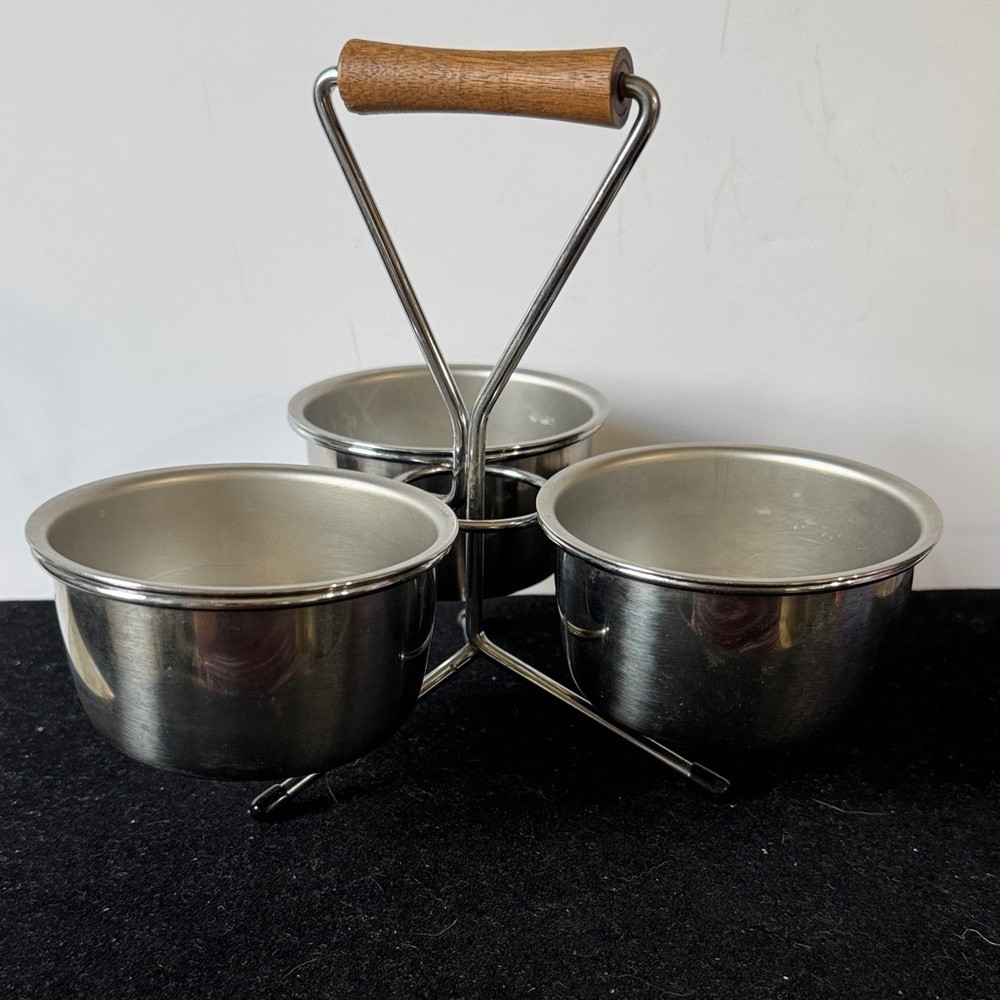 Vintage (MCM) condiment caddy w/three stainless steel bowls and a wooden handle